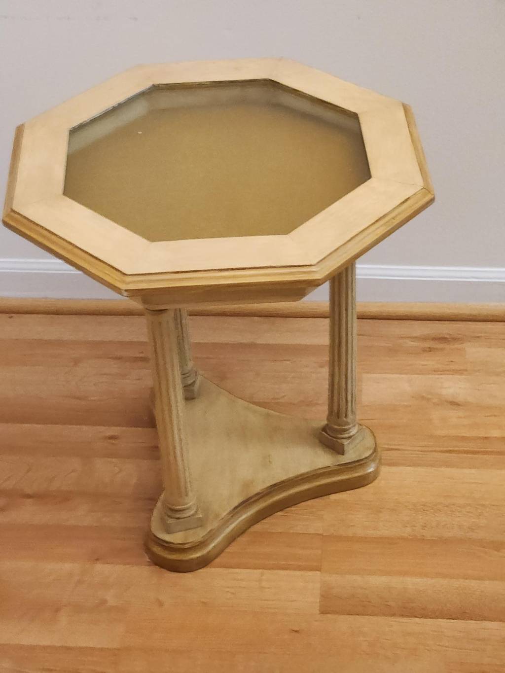 Occassional or tea table, glass topped storage or display compartment