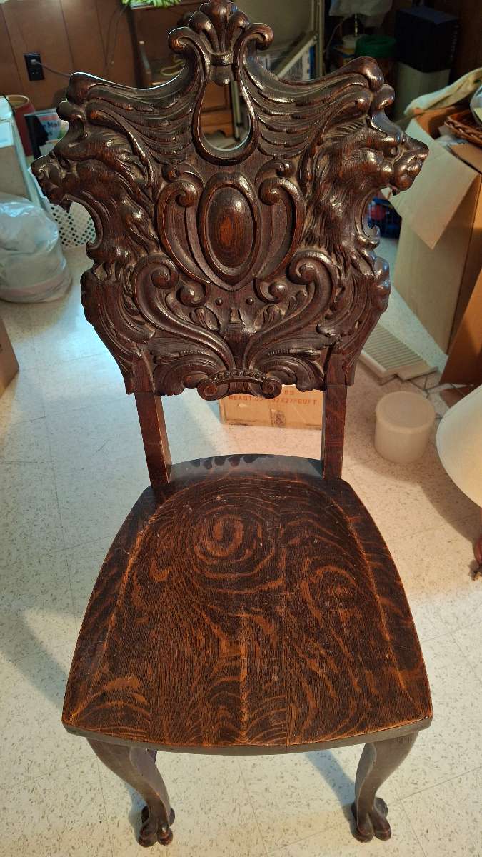 Antique quarter sawn oak carved lion griffon chair