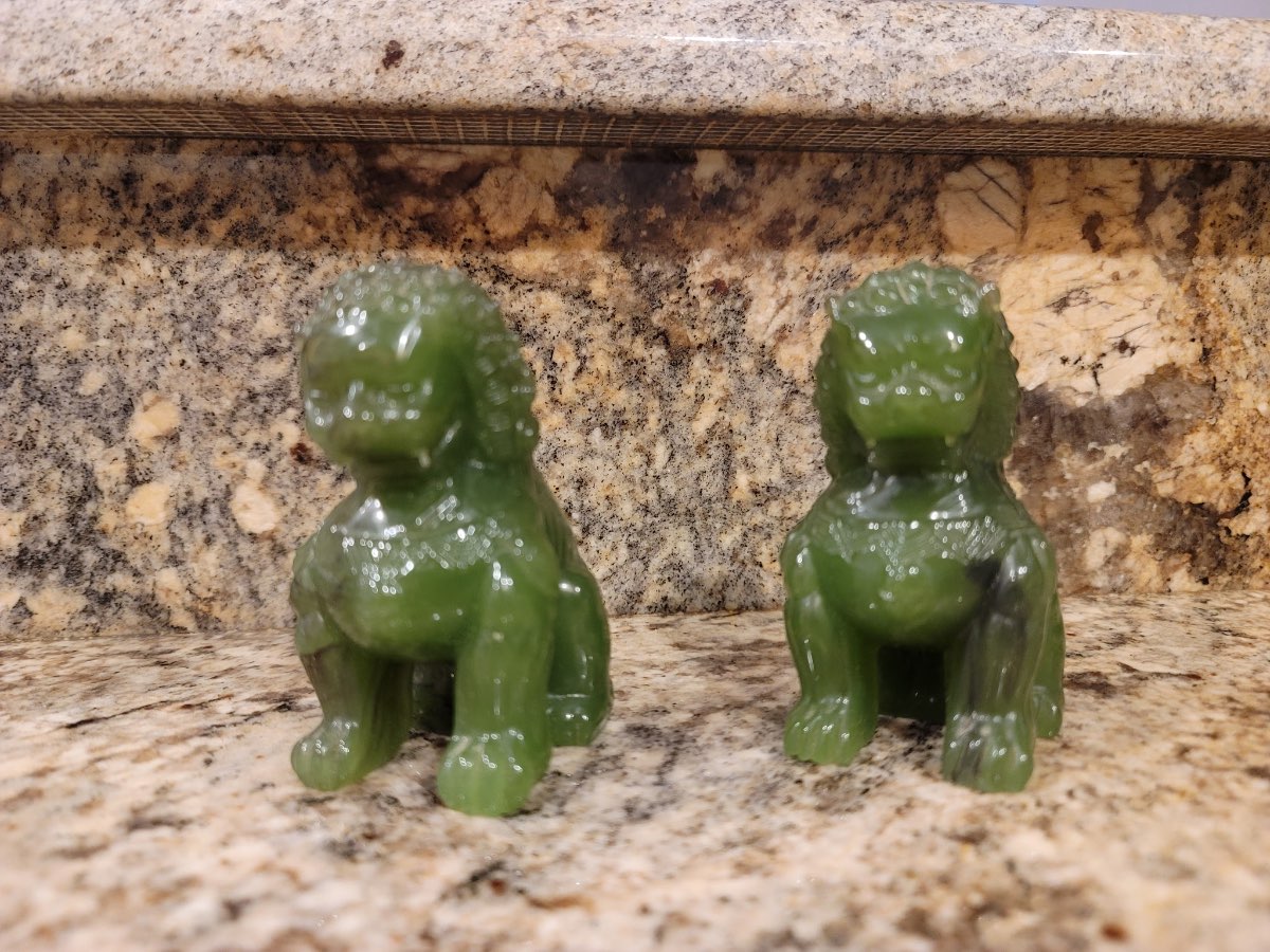 Pair of Green Stone Guardian Lion Sculptures