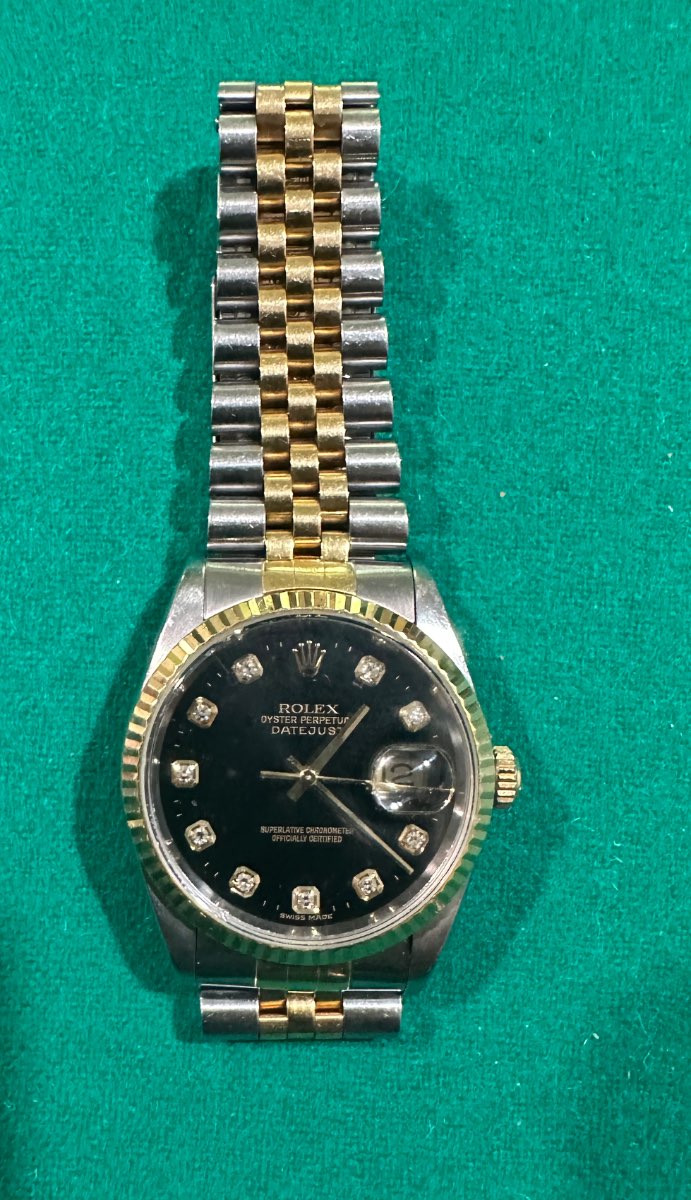 Rolex Oyster Perpetual Datejust — Two-Tone 18K Gold & Stainless Steel with Black Diamond Dial